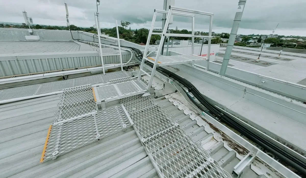 Roof walkway and fall arrest anchor system installed by Alpine-Tech 360 on a commercial building