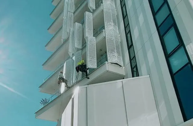 Alpine-Tech 360 rope access technicians at work on a high-rise building facade in Auckland